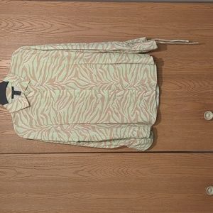 NWT Tiger print button up top with bell sleeves that you can tie.